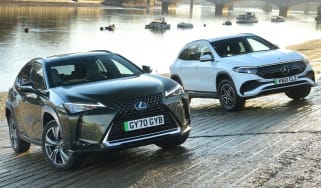 Lexus UX300e vs Mercedes EQA - two cars on river bank front